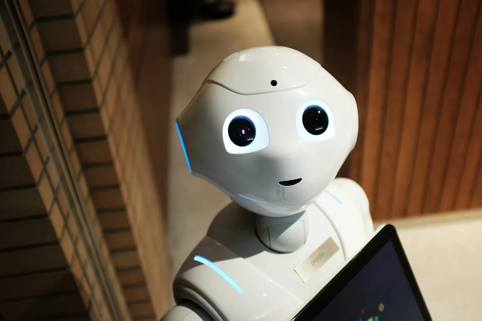 White robot with human features – representing artificial intelligence and cybersecurity.